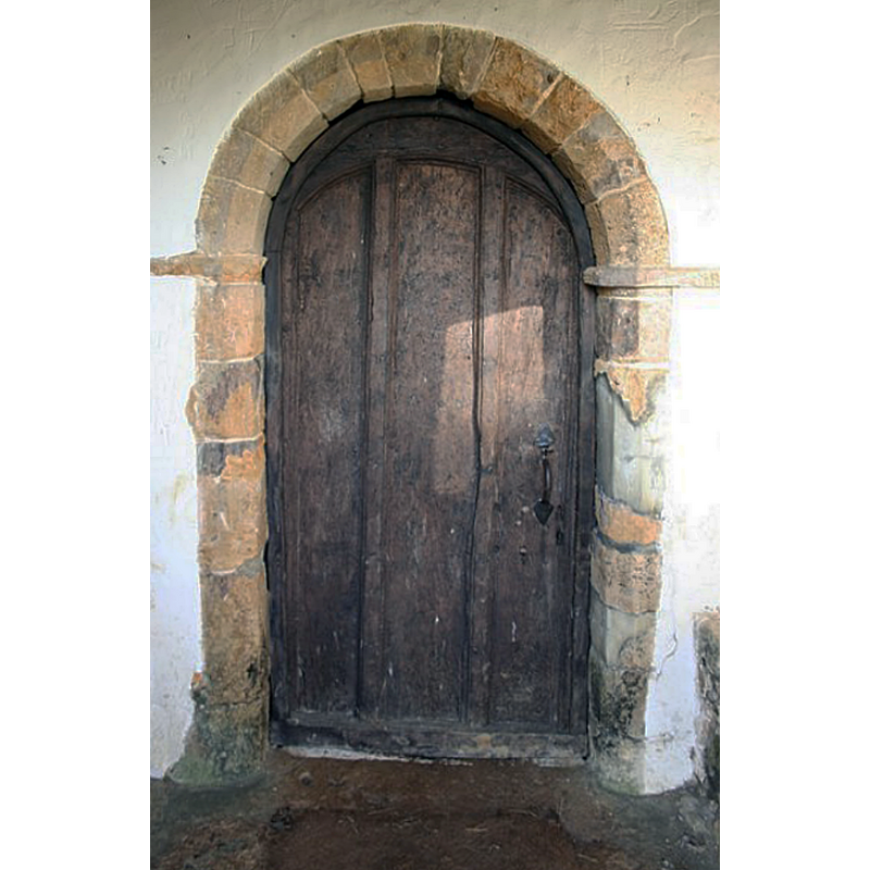 Source caption: "Late 12th century Transitional south doorway to All Saints' church"