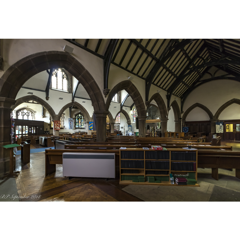 view from the west end of the south aisle across the nave