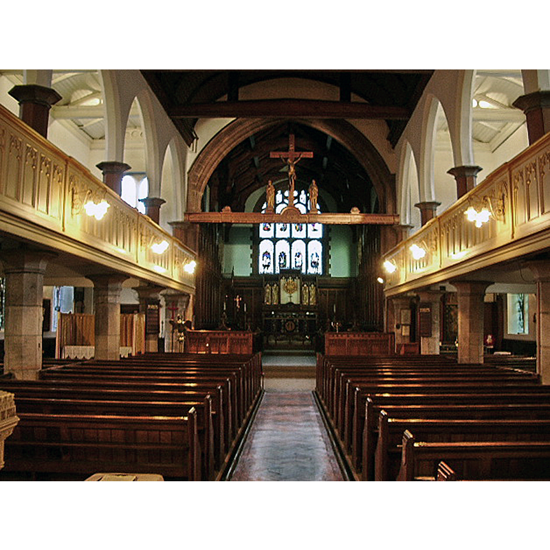 the 19thC re-building of a late-medieval chapel; the upper edge of the basin of the modern font peaks out in the bottom left corner of the image