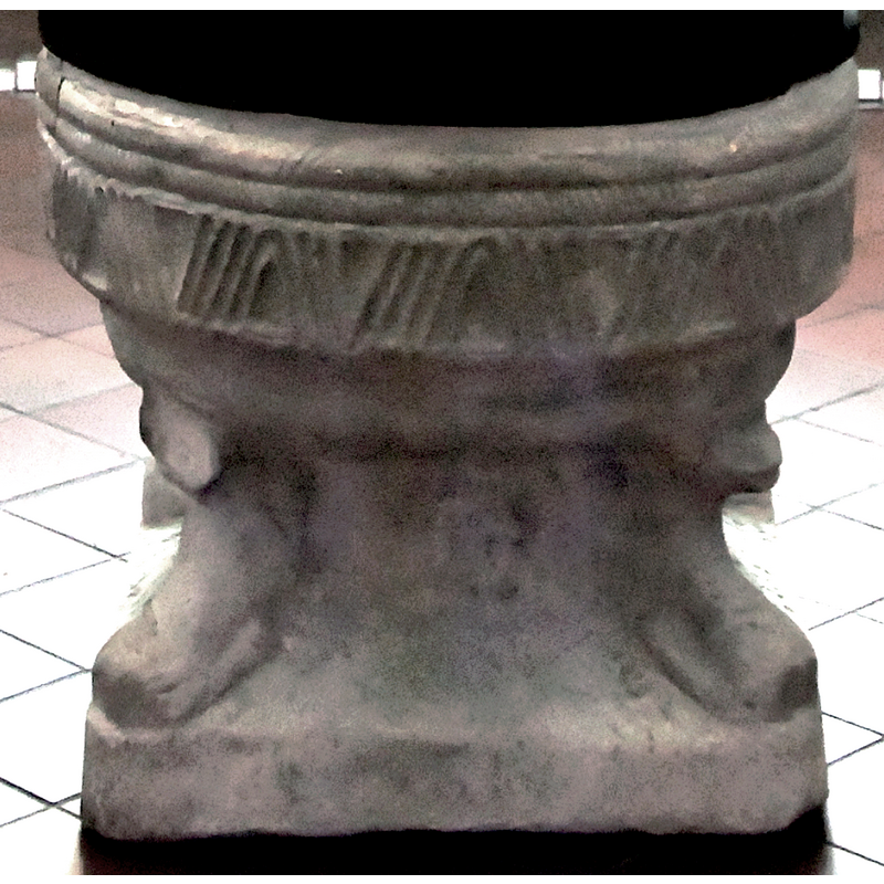 the head of the lion on the left is damaged