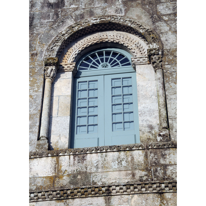 Romanesque window above the Romanesque west portal
