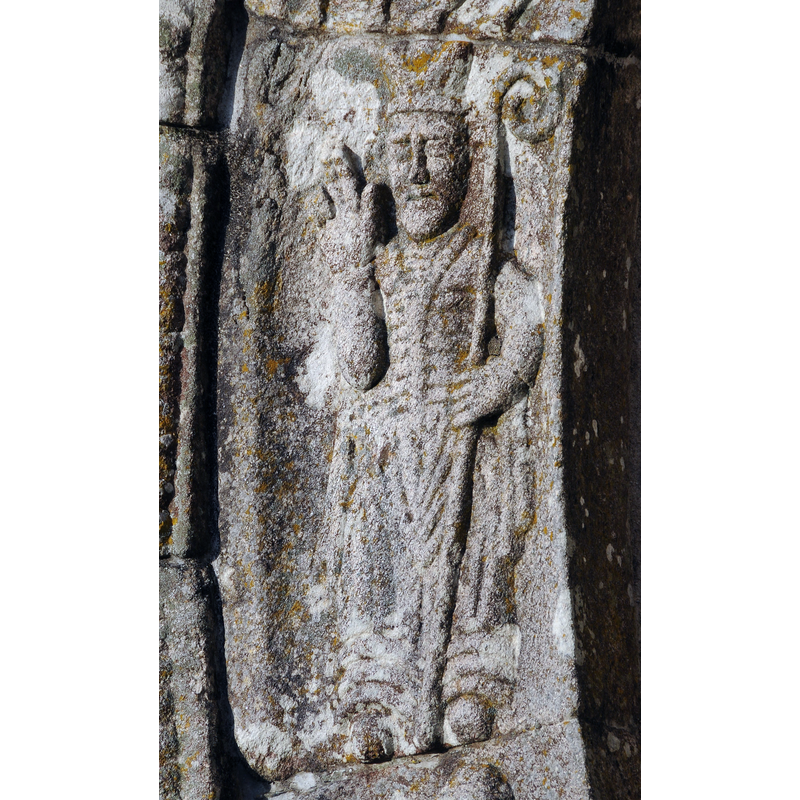 a bishop in the west portal of the Romanesque church in May 2010