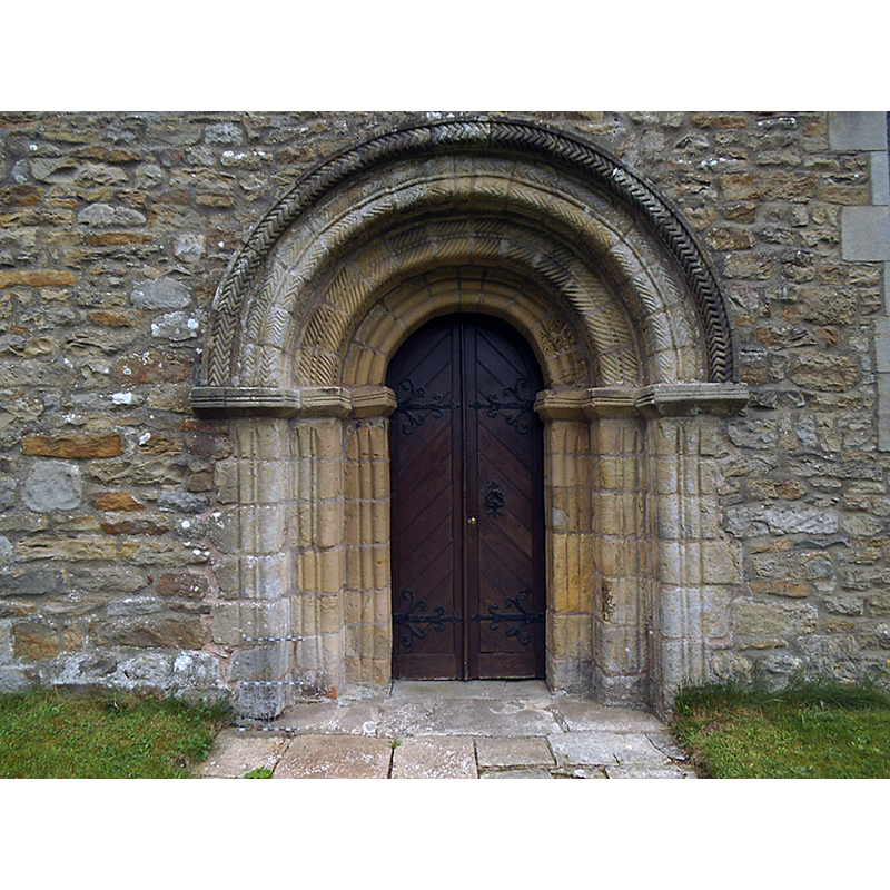 Source caption: "St John the Evangelist, Gressingham: south porch. A classic Norman design with concentric semi-circular arches and chevron carvings." [NB: more details on the portal at https://www.crsbi.ac.uk/site/5023/]