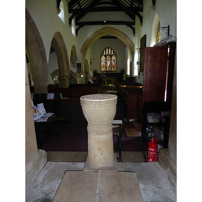 at the west end of the south aisle
