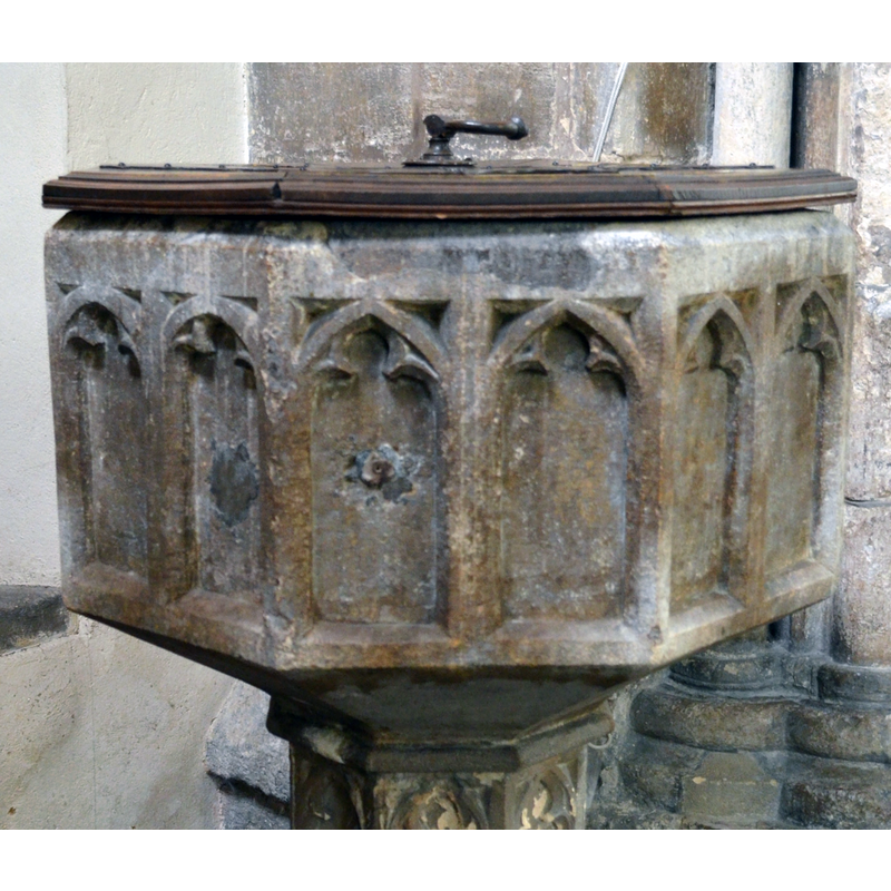 notice that the two arch-heads on the left pair are round, while the others are all pointed -- the plug in the middle of the central arch is probably an old anchoring spot for a cover lock