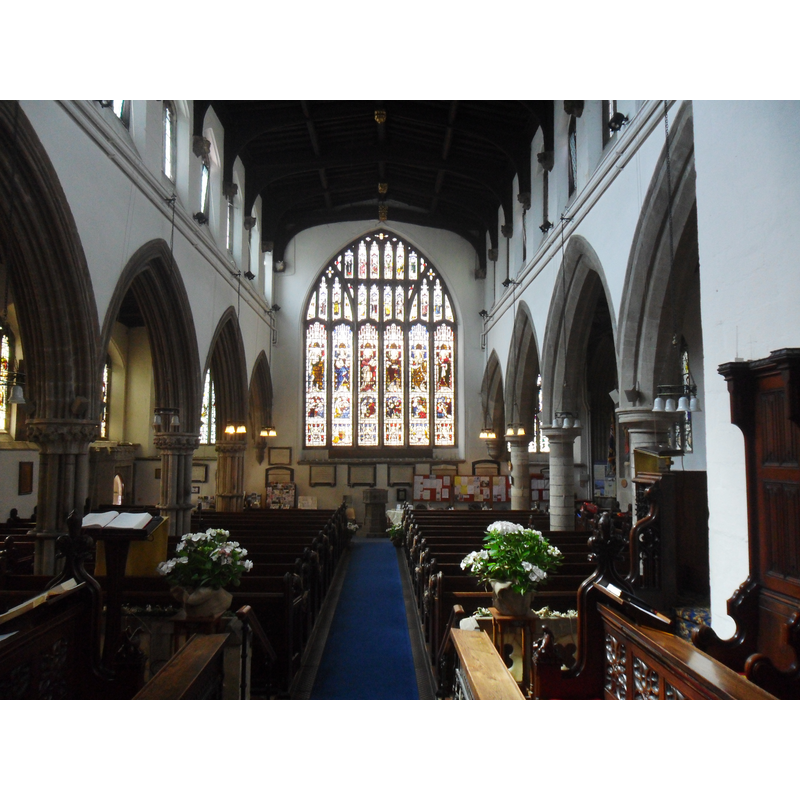 showing the font at the far [west] end of the centre aisle