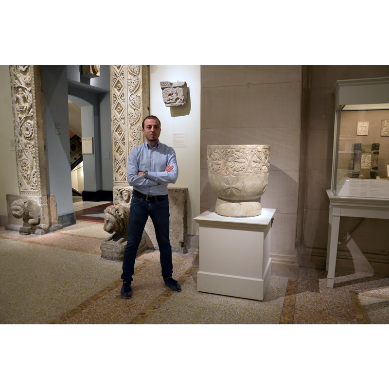 the font in the context of the display area in the Metropolitan Museum of Art, New York; standing on the left is the photographer, Giulio Sintongia