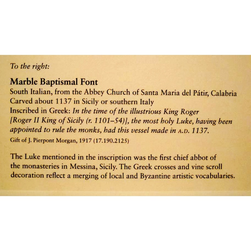 the museum label next to the exhibited font