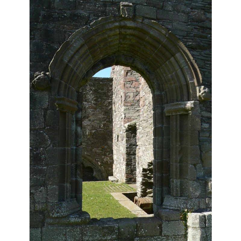 doorway opening into the east end of the nave and the chancel from the south side