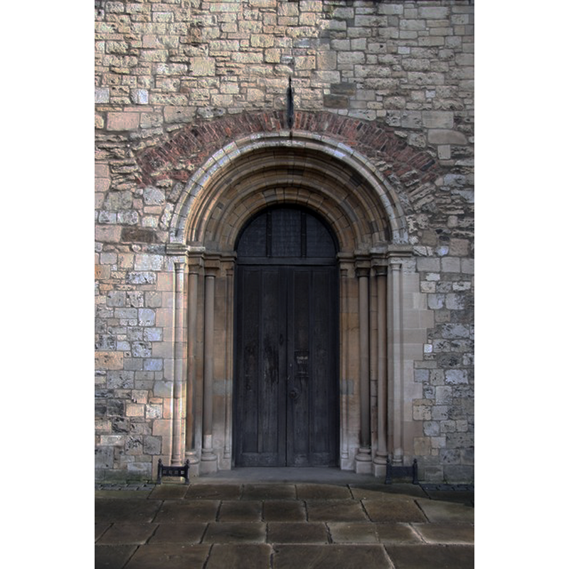Source caption: "West Doorway. The earliest part of St.James church, early 13th century Romanesque doorway, where the rest of the church is Gothic".