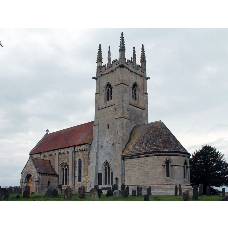 Source caption: "This is the site of the famous St Mary's Priory founded by the crippled priest St. Gilbert in about 1139 as a home for his white-robed Gilbertian order, the only purely English monastic order and the only one which catered for men and women alike. It was sited to the south of the present church but was surrendered and destroyed in 1558 and all that remains today are signs of earthworks, although excavations have been carried out that revealed the foundations together with fish ponds and the old well. The present church of St Andrew's was once much larger than the present building but a Norman chancel and transept were taken down in 1788 after becoming dilapidated, leaving the tower unusually at the east end of the building. A priest's door was also removed and in 1899, the arch was returned and incorporated into a new porch that was designed to protect the original Norman door."