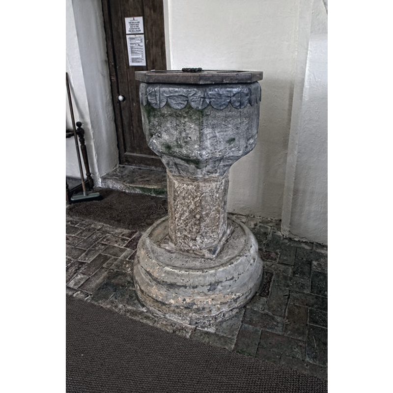 The CRSBI (2019) notes: "The base of the font has also been attributed to the Romanesque period. [...] According to the church guide, the font base is a 12thc column base from the Gilbertine Priory that once stood nearby. The diameter of the base is quite large at 2.54 m and, if it did once form part of the old Priory, it was surely a plinth to a column system rather than the base. However, there are no indentifying characteristics to substantiate this speculation."