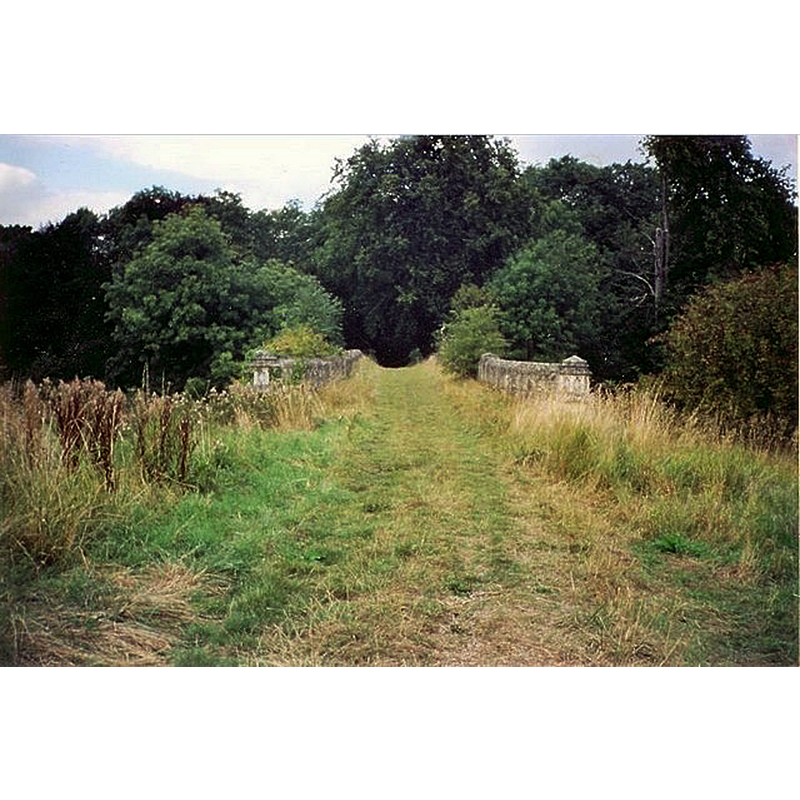 Source caption: "Located about two miles to the north-west of Habrough, this bridge was part of the grounds of an old abbey (Newsham Abbey) built around 1143. Long since demolished this bridge survives as does the lake and associated woodland."