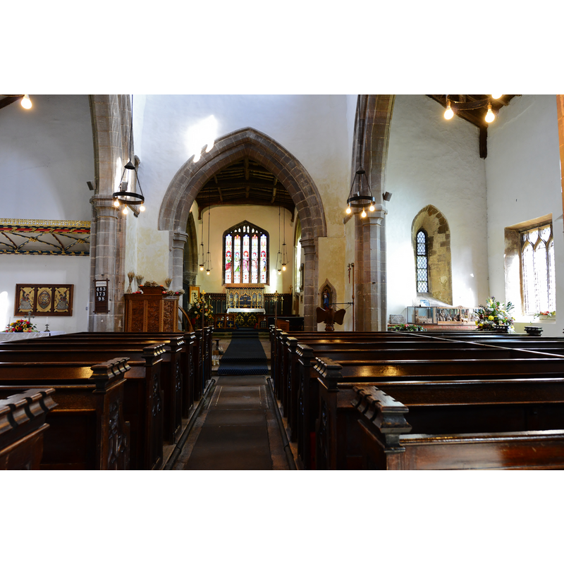 Source caption: "Hough on the Hill, All Saints' Church: The nave and Early English two bay arcades".