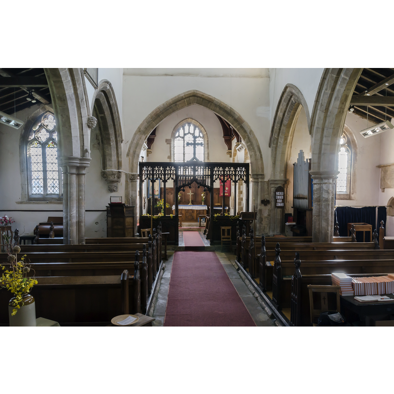 Source caption: "the windows of the north aisle and the east window of the south aisle are Decorated, while the clerestory and tower-top are Perpendicular. The church was restored by Charles Kirk in 1881, when the chancel was rebuilt."