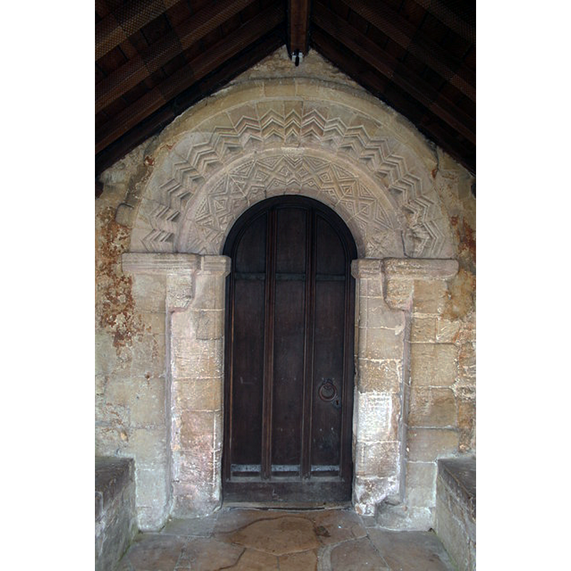 Source caption: "Splendid Norman carving, unfortunately missing the shafts on the south doorway to the church of St.Thomas the Martyr, Digby".