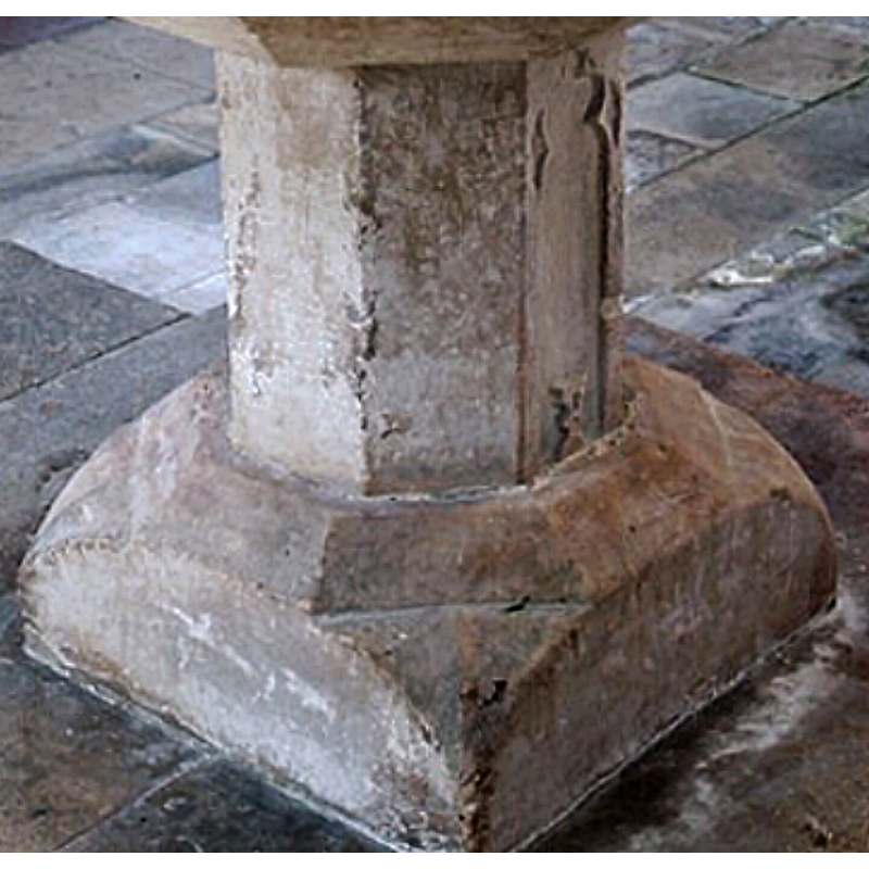 "At the base of a little shallow niche, or panel, worked in the stem of this font, appears a miniature chalice" [cf. Font notes]