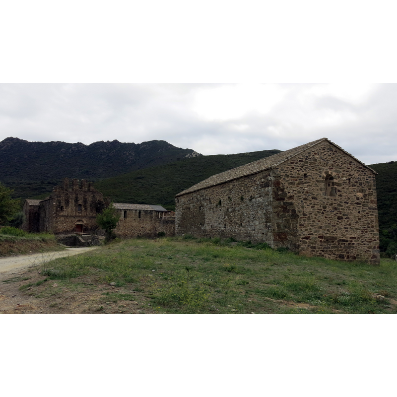 view of the monastic compound showing west view of the two churches: on the left is Sant Quirze's monastic church; on he right is the supposedly parochial church of Santa Maria [the latter has only a south entranceway]