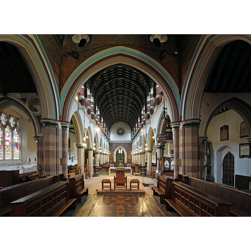 with the modern font visible at the far [west] end of the centre aisle