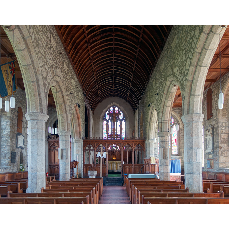 the baptismal font is partially visible at the far [east] end of the nave, behind the left [north] bank of benches -- "Originally in the tower entrance, it was moved in fron of the pews [east end of the nave?] during the incumbency of the Revd. Peek [ca. 1980] so that children could be baptized in front of the congregation." [cf. FontNotes]