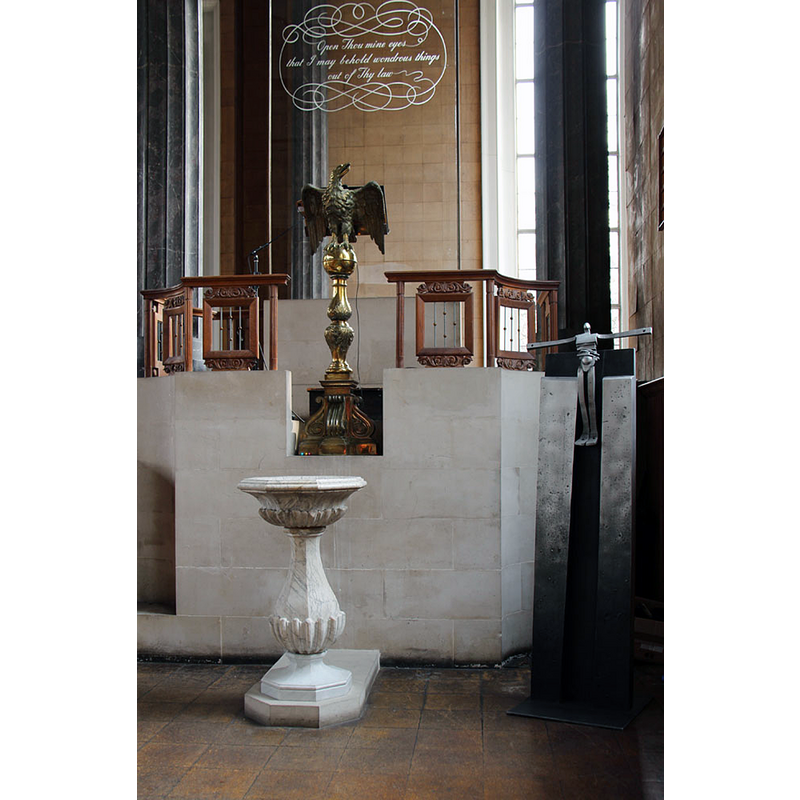the modern (18thC?) font is located at the east of the nave, south side, at the foot of the modern pulpit