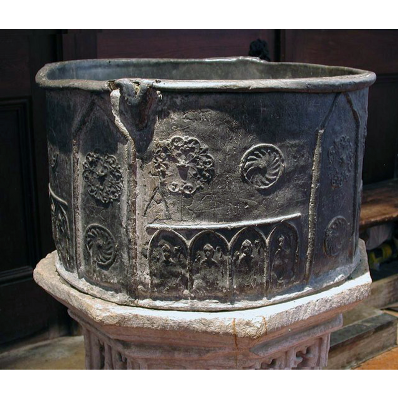 notice the graffiti incised on the sides and the 'deformity' of the area of the upper rim where the anchors for the cover lock probably were