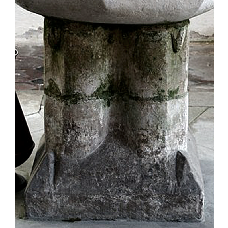 the 14thC base of the present font in use