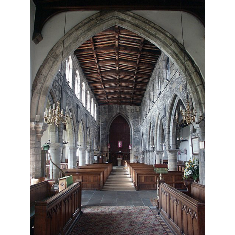 view west from the chancel with the baptismal font at the far end of the centre aisle