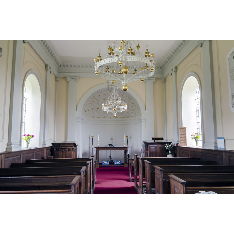 Source caption: "Inside there are 18th century pews, a pulpit and reader's desk, and several wall plaques to the Earls of Scarbrough."