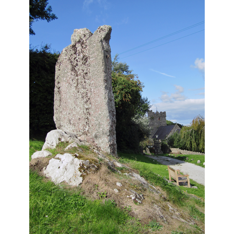 the large stone in the foreground is said to be the base of a wheel cros and to have been used as a pillory in the past