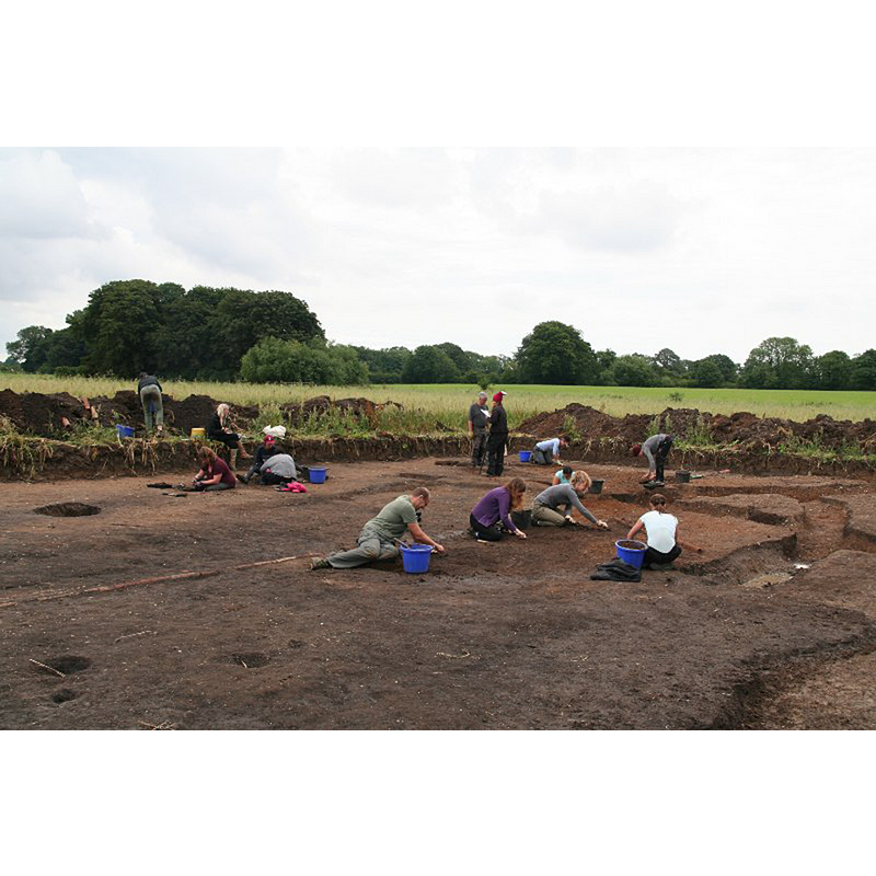 Source caption: "Open day in a Saxon oat field in Little Carlton [...] An important high status Saxon site is being unearthed in this field, and today the public is invited to visit, with an escorted tour by the archaeologist in charge." [cf. FontNotes for the discovery of an Anglo Saxon limestone grave cover "dated to the later tenth to eleventh century" found in the rubble of the demolished church here].