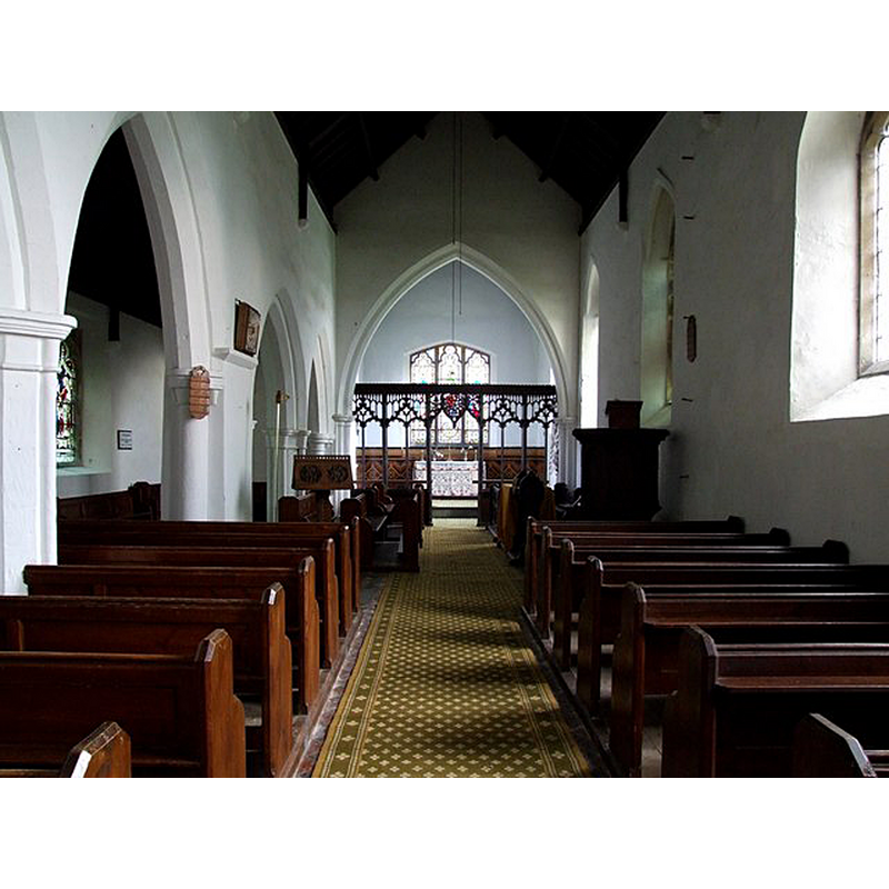 Source caption: "Interior of St Benedict, Scrivelsby. The nave and north aisle, looking towards the chancel through the rood screen."