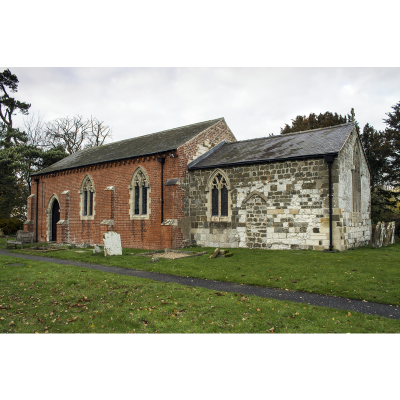 Source caption: "The church dates from the 13th century and was rebuilt in 1841. It consists of nave, chancel and a western bellcote, and is built in brick and chalk with ashlar dressings. Roofs are of slate."