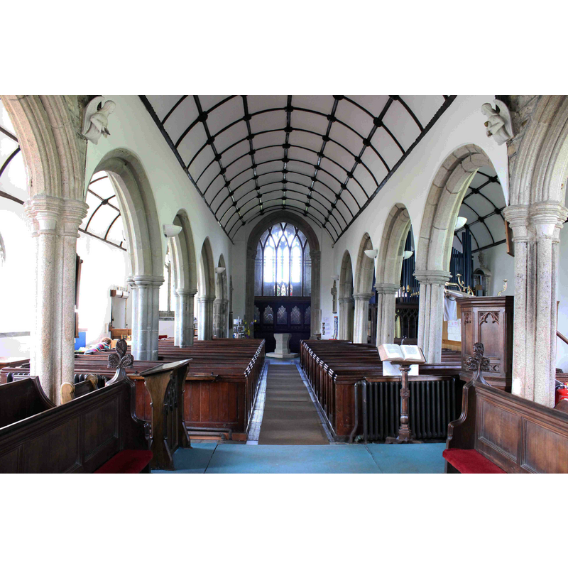the modern font at the west end of the centre aisle