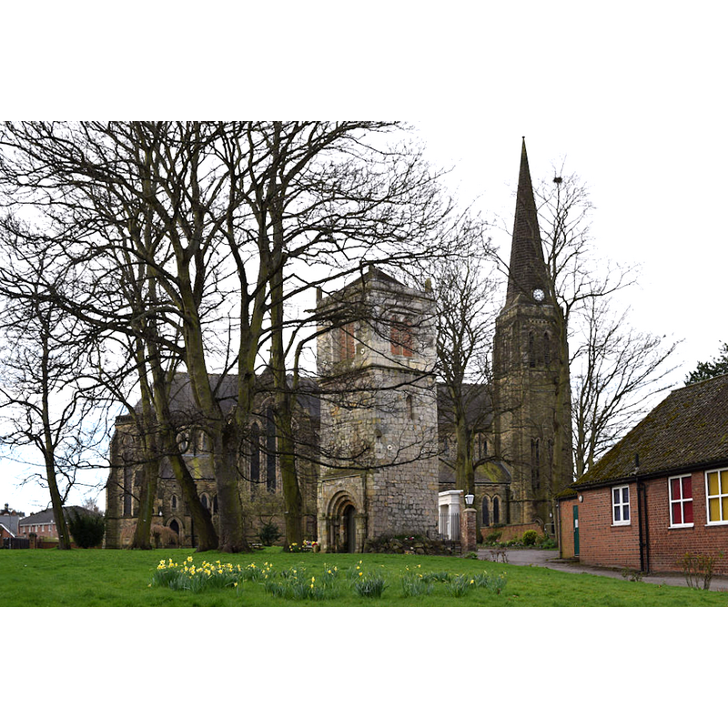 Source caption: "Church of St Lawrence, York. The main church was built in 1881-93. In front of it is the west tower of an older church, parts of which are 12th century. The rest of the old church was demolished when the new one was built."
