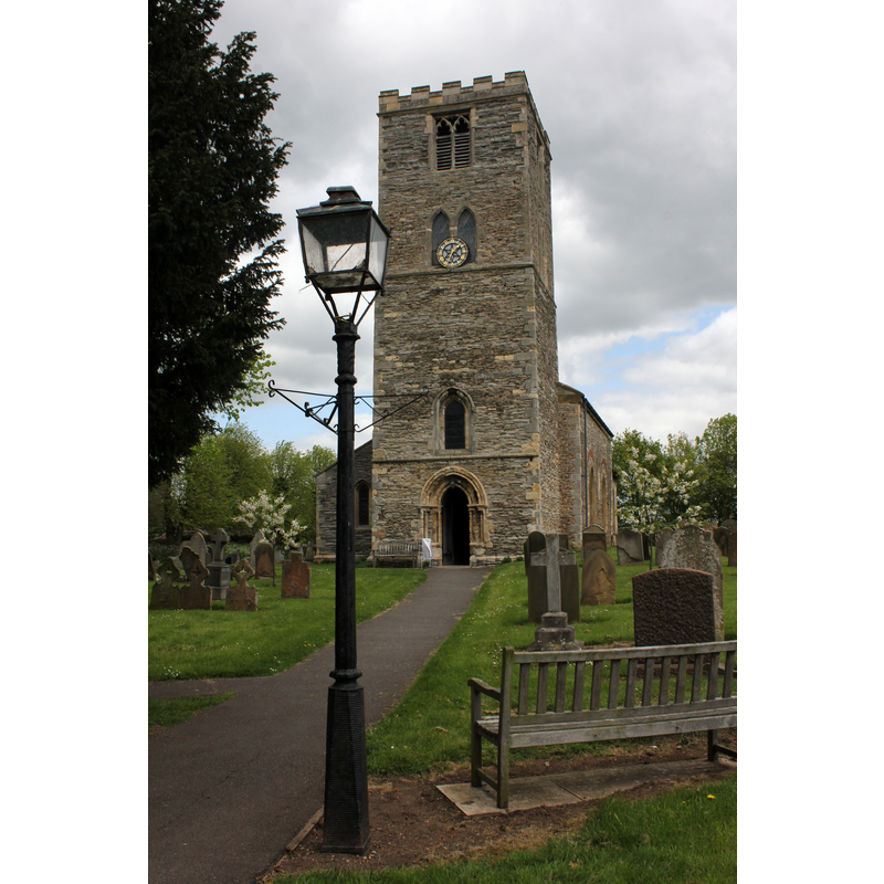 Source caption: "St Peter's Church High Street Newton on Trent. The church is of Norman origin but has undergone considerable changes to its layout over the years."