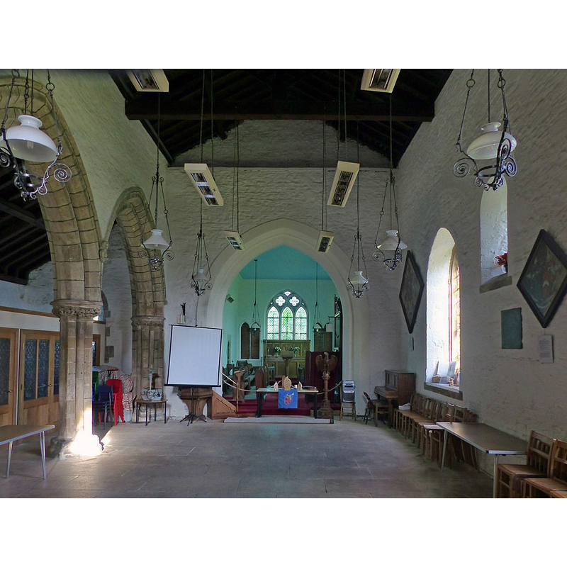 Source caption: "Church of St Peter, Newton-on Trent. The nave looking east, cleared for communal activities. The chancel arch was created during the 1818 rebuilding."