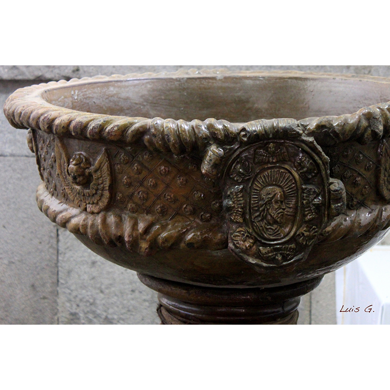 in an oval cartouche
