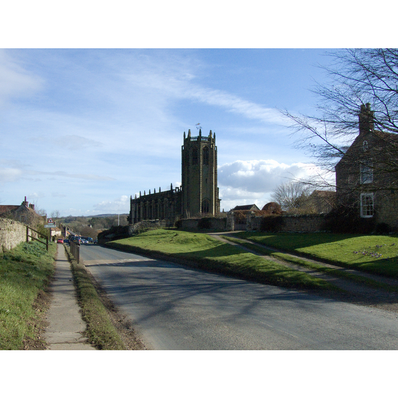 Source caption: "Entering Coxwold from Thirsk Bank St Michael's Church stands proudly on the right"