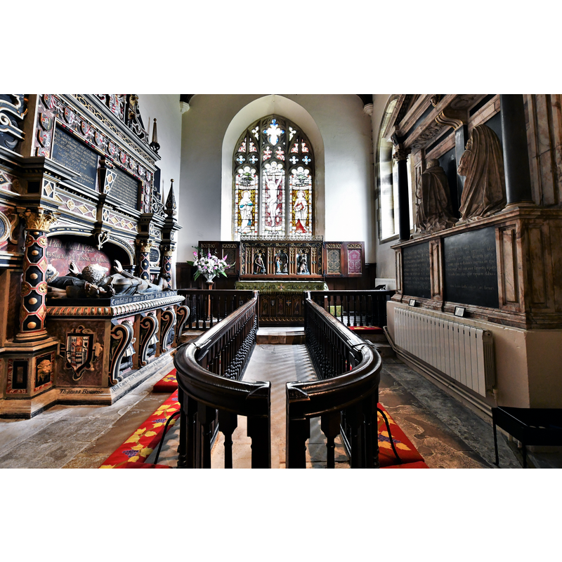 Source caption: "Coxwold, St. Michael's Church: The chancel with its unusual horseshoe communion rail"