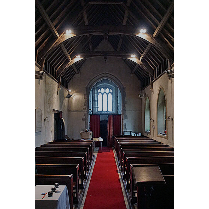 the old font is partially visible at the far end, by the south entranceway