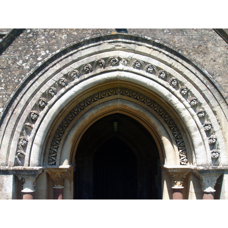 Source: "South porch detail. Although based on a Norman style, the porch is actually Victorian (1856) and believed to have been produced by the office of Sir Gilbert Scott."