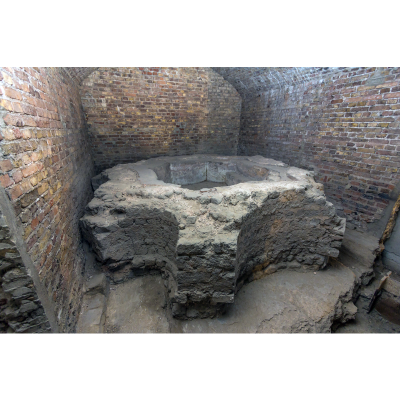 ruins of the baptismal font from a free-standing 7th-century baptistery existed in what is now the east end of the cathedral; the baptistery itself was demolished in the 9th century