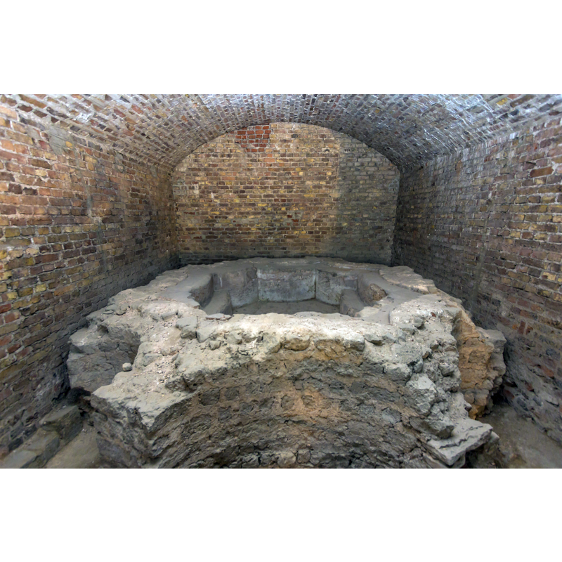 ruins of the baptismal font from a free-standing 7th-century baptistery existed in what is now the east end of the cathedral; the baptistery itself was demolished in the 9th century
