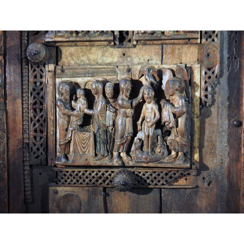 one of the panels of the old wooden door: Presentation at the Temple and Baptism of Christ