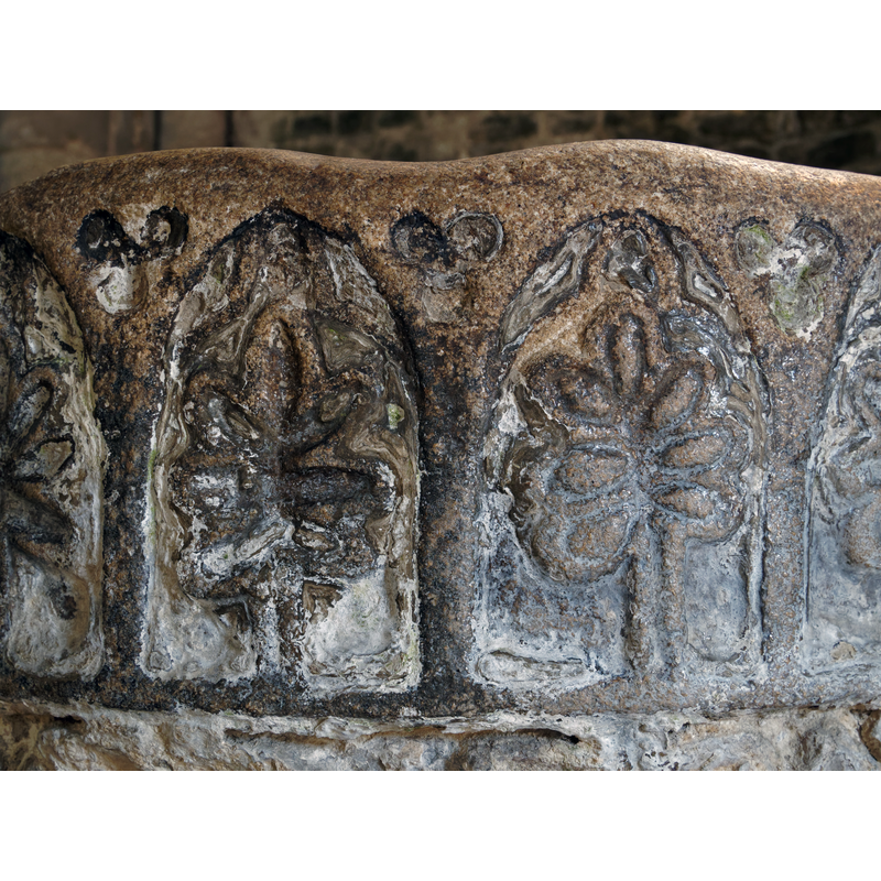 one in each arch of the arcade