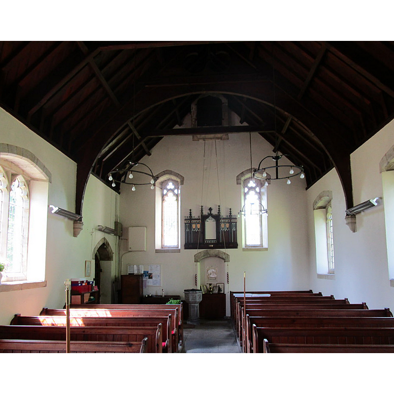 the present font in use is visible at the far end, opposite the south doorway