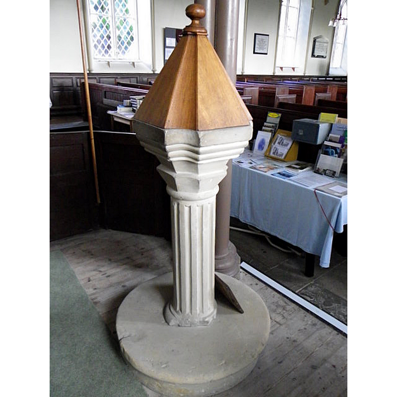 Source caption: "Interior, St Mary's Church, near to Langthwaite, North Yorkshire, Great Britain. This is the original font which has a small basin and pyramidal cover."