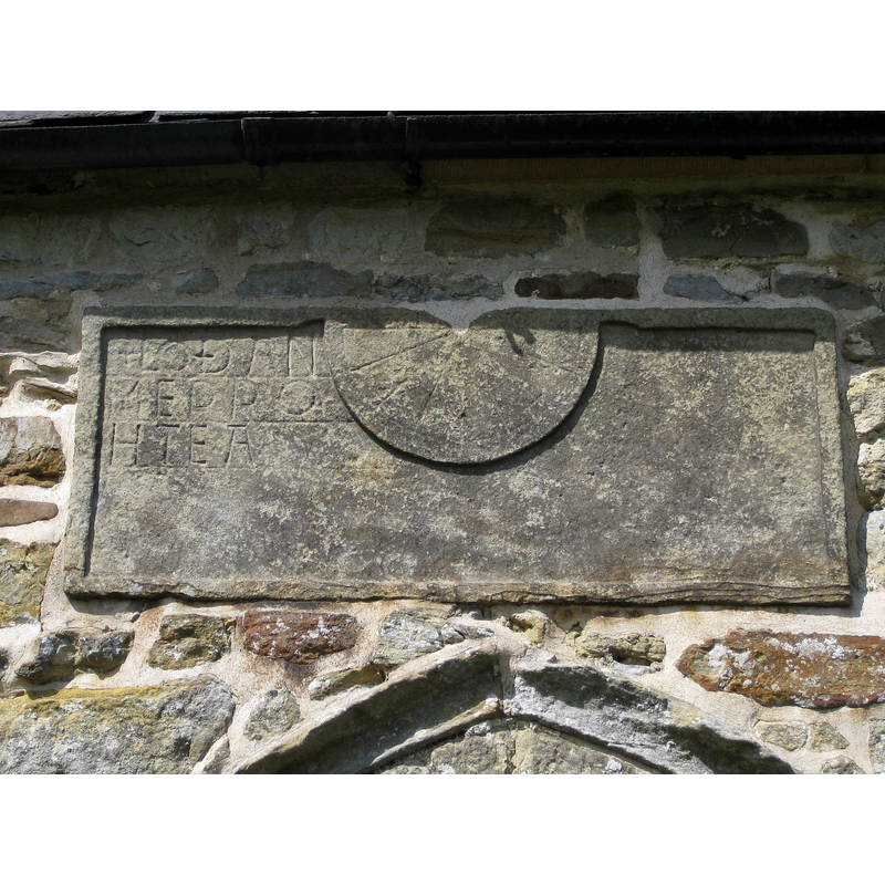 Source caption: "Anglo Saxon sundial, St Michael and All Angels Church. The gnomon is missing."