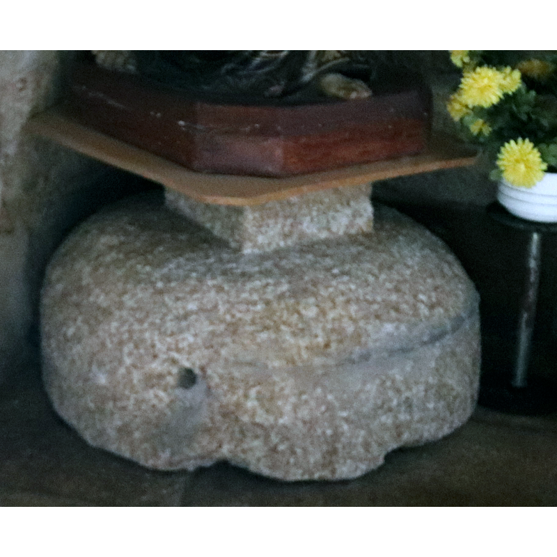 possibly a font turned upside upside-down to support the statue on top -- could be a font from another church, since this church functions now as a museum for liturgical pieces gathered from other churches